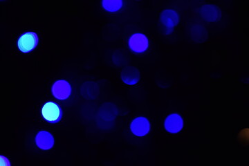 Lights blurred bokeh abstract on dark background, rozmyte światełka na ciemnym tle lampki...