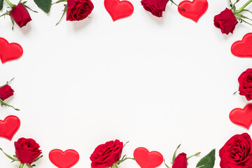 Valentine's day, love, romantic concept. Red roses and hearts on white background. Flat lay, top view, copy space