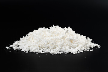 white artificial synthetic snow on black background