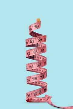 Spiral measuring tape vertical standing.