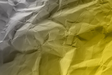 Crumpled paper in Illuminating and Ultimate gray. Colors 2021. Abstract trending background image.