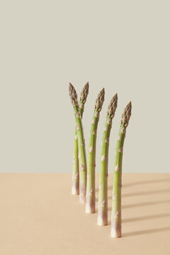Vertical row of natural asparagus.
