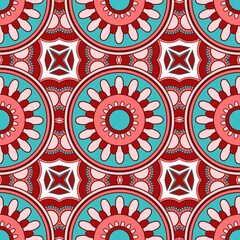 Mandala seamless pattern vector. A symmetrical round red and blue ornament.