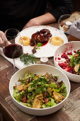 Christmas dinner. Happy couple celebrating Christmas