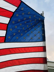 american flag on a barn