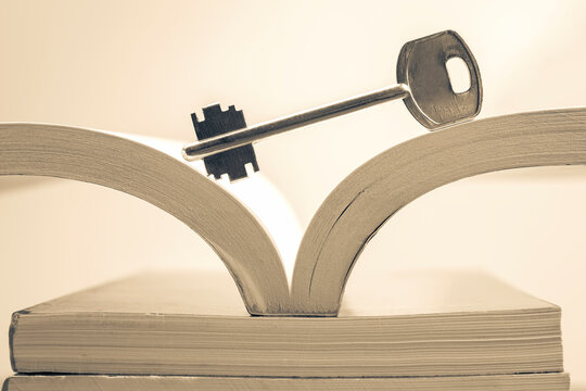 Key and open textbook of life. The book is the key and opening to knowledge and wisdom.