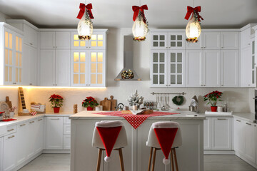 Stylish kitchen interior with beautiful Christmas decor