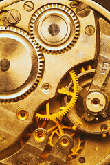 Close-Up Of Old Clock Watch Mechanism. Retro Clockwork Watch With Golden Gearwheels Gears. Vintage...