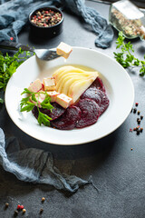 salad beets, pear and cheese natural organic snack ready to eat on the table healthy meal snack ingredient top view copy space for text food background rustic keto or paleo diet