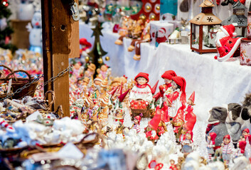 Sculptures and toys of elves and angels. Christmas market. Christmas and New Years Eve.