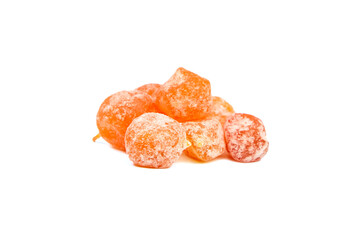 Candied kumquats, heap of dried fruits isolated on white background