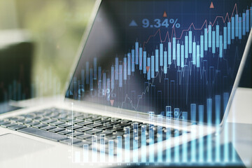 Double exposure of abstract creative financial diagram on modern laptop background, banking and accounting concept