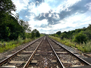 Fototapeta na wymiar Leeds to Bradford railway line, on a cloudy day in Pudsey, Leeds, UK