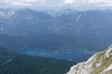 Fototapeta na wymiar Eibsee lake at Zugspitze mountain tour, Bavaria, Germany