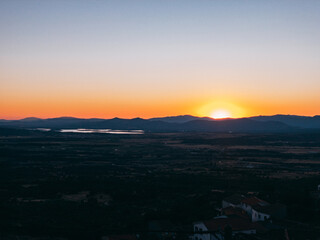 Amazing sunset over mountains in countryside