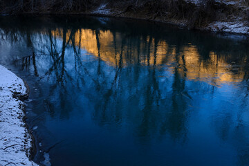 Early Winter Late Autumn Golden Mountain Reflected in River Water Snowy Ground Blue Sky Beautiful Light