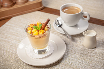 Spicy pumpkin dessert with cream cheese and biscuit