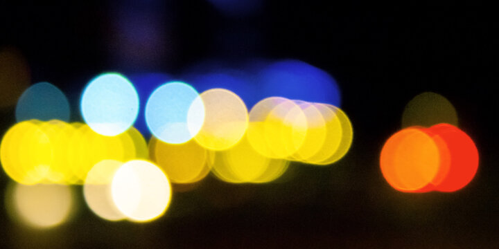 abstract background of street lights. de focused image with bokeh effect