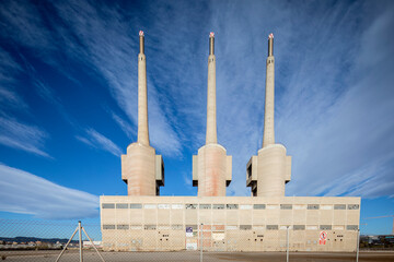 Three chimneys disused power station in barcelona