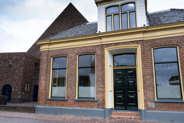 Reformed church of Appingedam with adjoining rectory, the rectory dates from 1879 and has neoclassical features