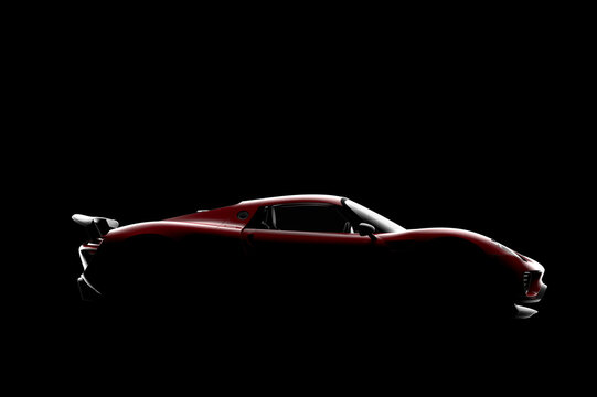 Silhouette of a red generic sport car in the dark