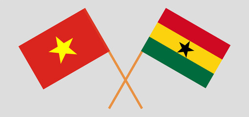 Crossed flags of Vietnam and Ghana. Official colors. Correct proportion