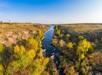 Small fast stream Kamenka in the evening light in Ukraine