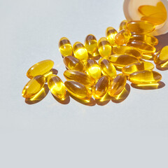 Omega3 gel capsule. Sun shadow. Yellow vitamin. Health eating. Dietology drug. Fish oil supplement....