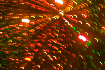 Defocus lights background - blurry defocused zigzag lights shoot out from the center, red, yellow...