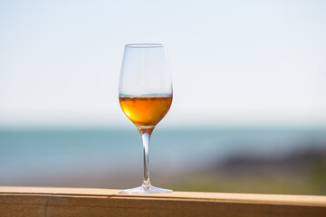 Beautiful scene with wine glass standing alone