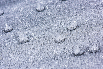 Ice crystals forming on sand grain..
