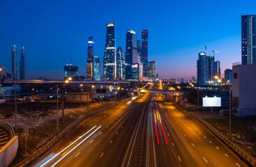 Fototapeta na wymiar Moscow, Russia. Night view of the highway and skyscrapers of Moscow City