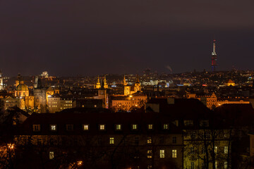 .light from street lights and a view of the city of Prague
