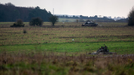 Fototapeta na wymiar challenger 2 battle tanks on maneuvers on salisbury plain military training grounds