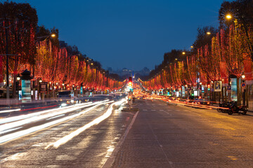 Fototapeta na wymiar Paris,France - 12 09 2020: View of the Avenue des Champs Elysées with Christmas lights