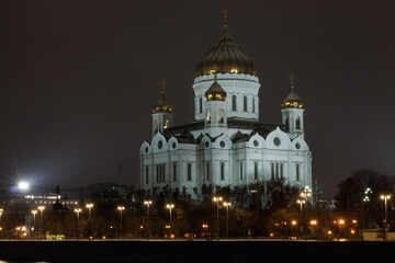 Fototapeta na wymiar Christ The Saviour Cathedral in Moscow, Russia. Evening. View from opposite river bank