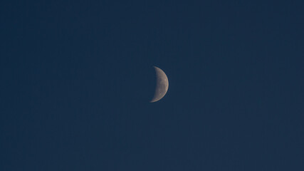 Obraz na płótnie Canvas crescent moon in the morning sky