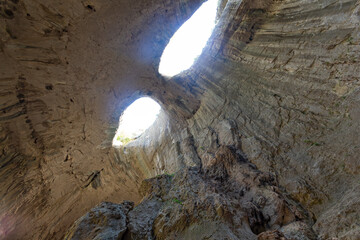 Prohodna cave known as God's eyes, Bulgaria