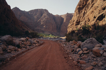 a dirt road in a canyon