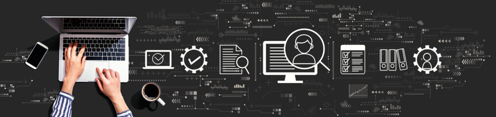 Document management system concept with person using a laptop computer