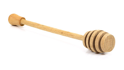 Wooden honey dipper on white background