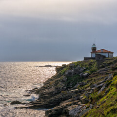 Fototapeta na wymiar the Monte Louro Lighthouse at the Punta Carreiro in Galicia