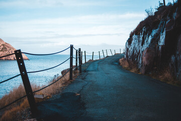 delapitated fence on the cliff