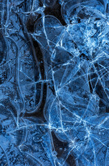  frozen shards of blue broken ice. abstract winter background.