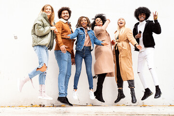 Group of multiracial happy friends having fun together, smiling.