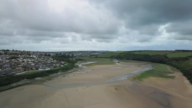 Populated Cornish Town Of Newquay United Kingdom By The Gannel River - aerial shot