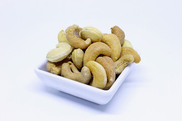Portion of cashew nut isolated on white background