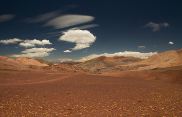 Desert landscape high in the Andes mountain range. View of the brown land and colorful mountains in Laguna Brava, La Rioja, Argentina.