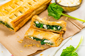 Spinach and Feta Cheese Strudel. Puff Pastry Filled with Spinach and Ricotta Cheese. Selective focus.