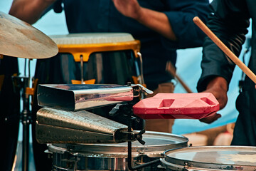 hands and the percussion section at a symphonic concert